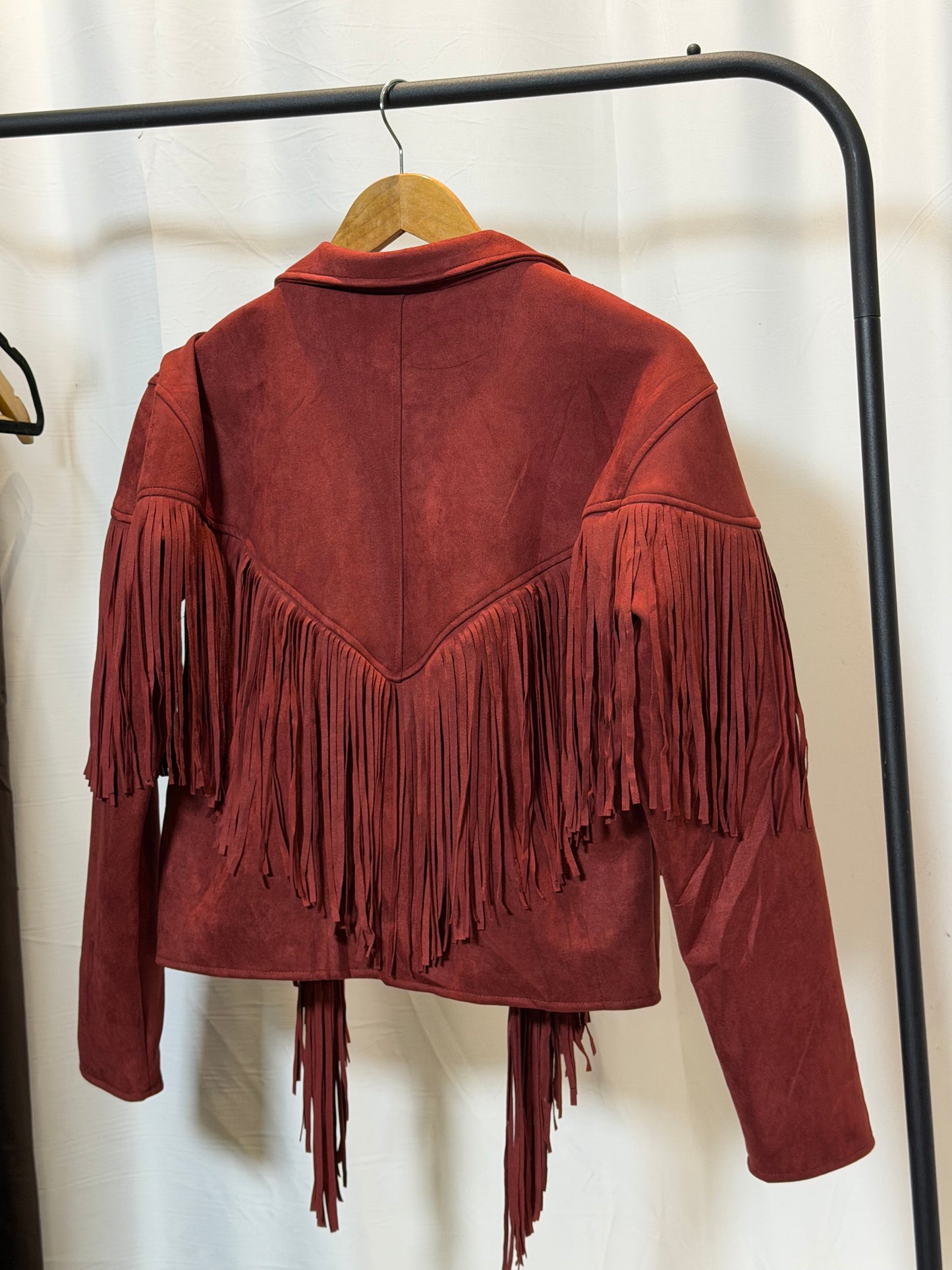 Chaqueta flecos